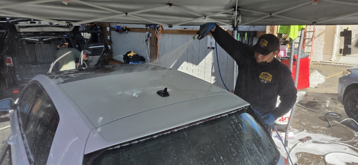 Premium hand wash on a white car